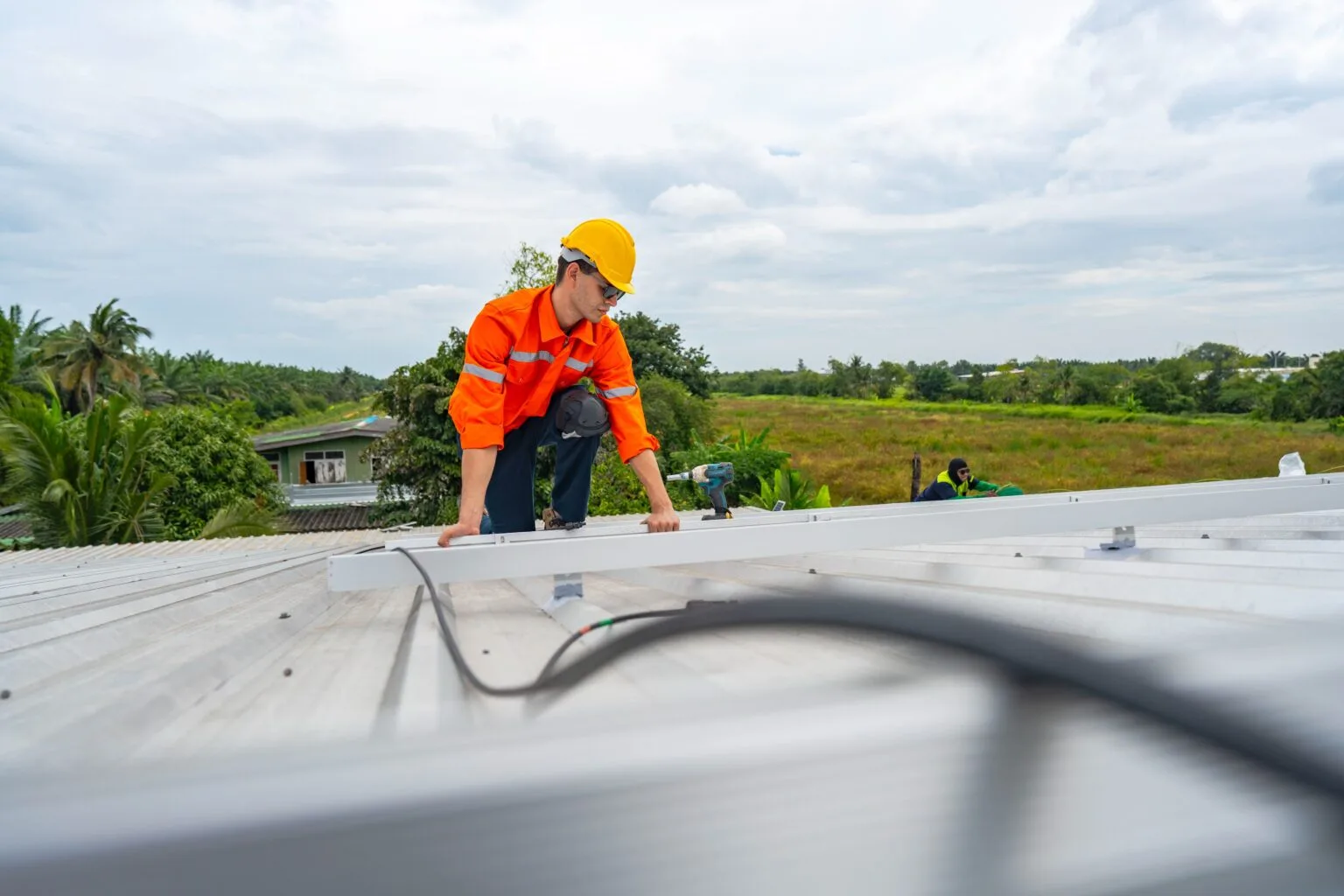 technician-lifting-a-photovoltaic-panel-during-ins