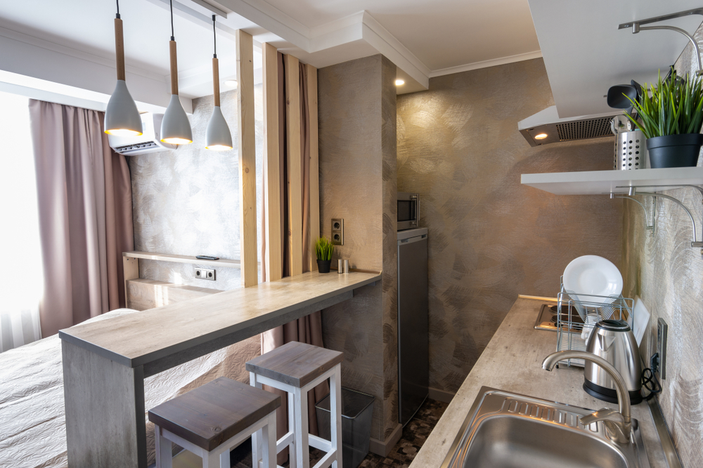 View,Of,The,Kitchen,And,Bar,In,A,Small,Hotel