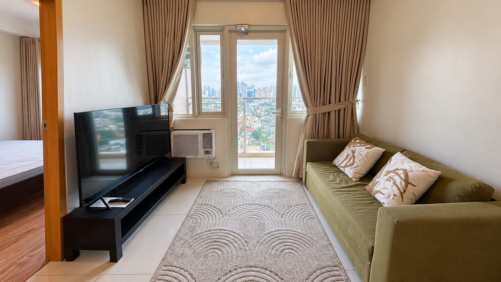 Modern Living Room with City Balcony View