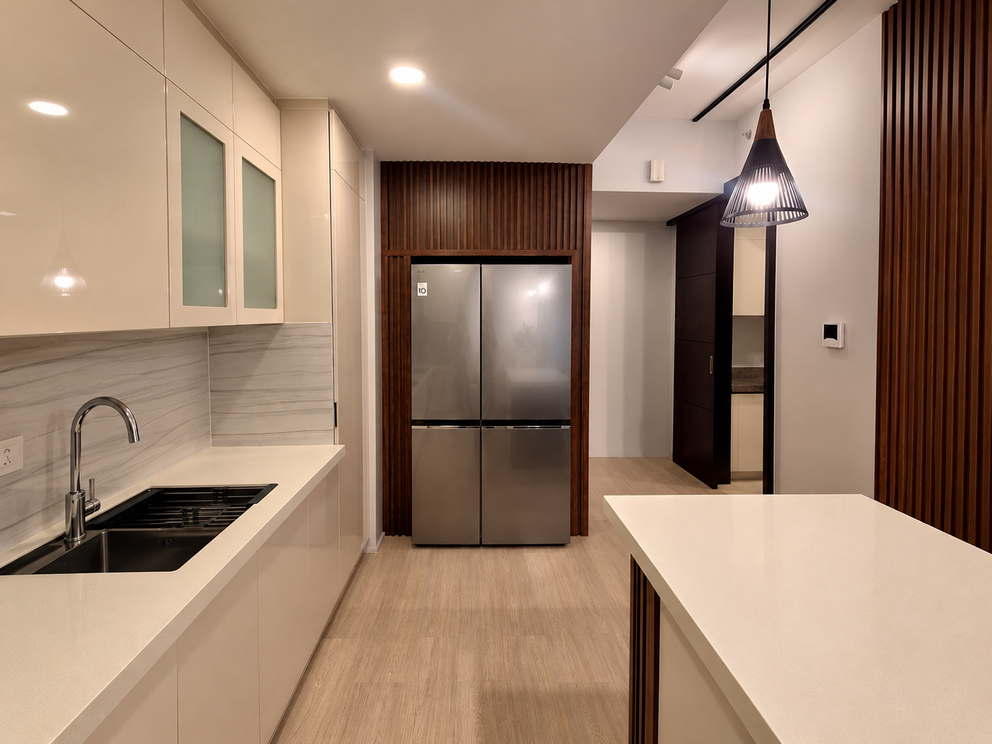 Warm Minimalist Kitchen with Wood Accents