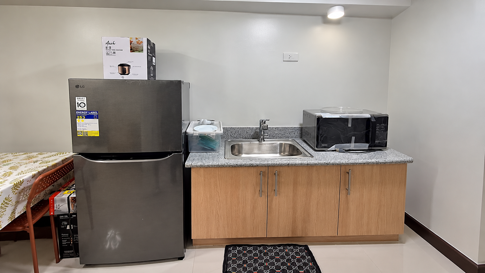 Bright Modern Kitchenette with LG Fridge and Sink