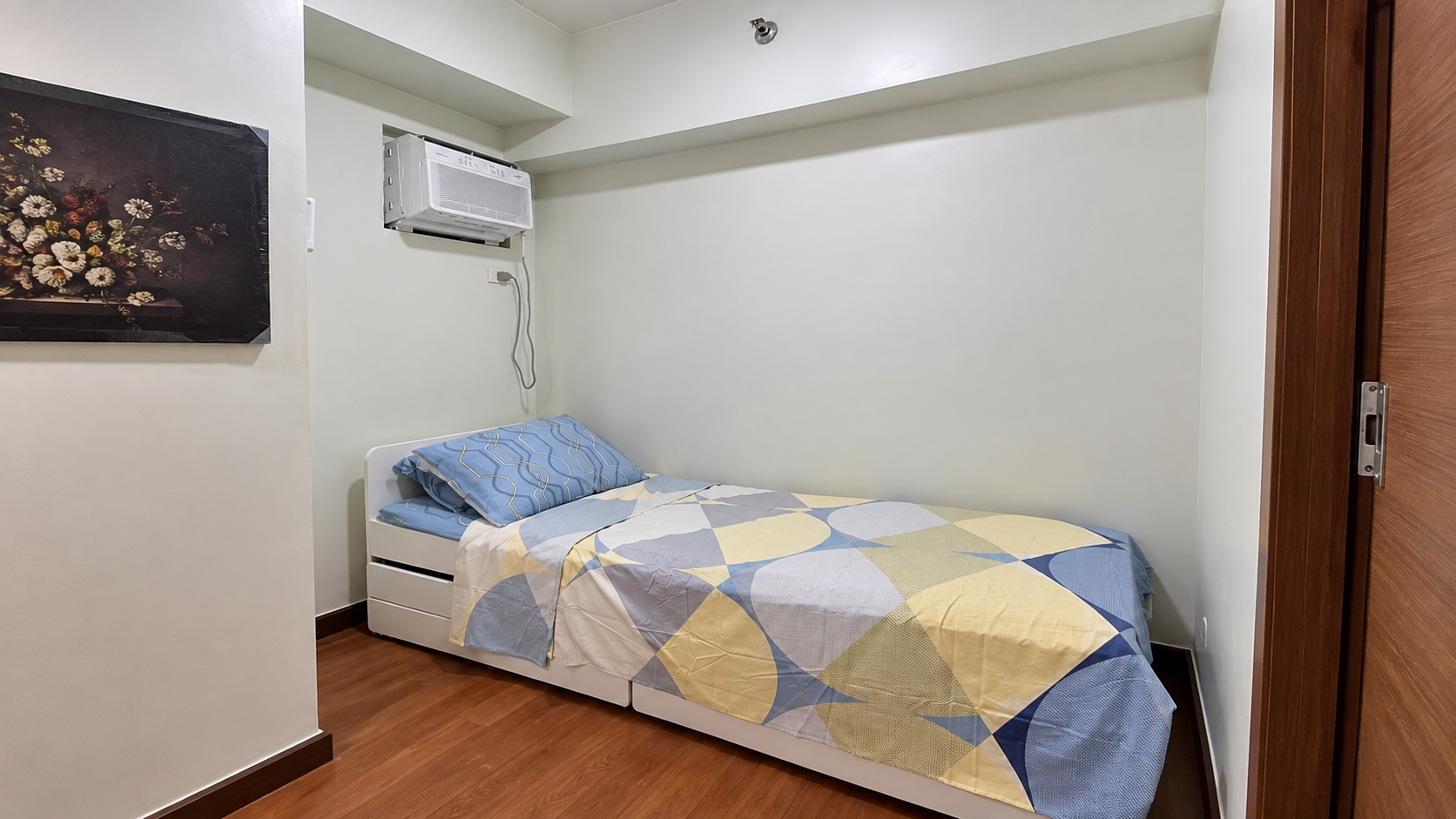Minimalist Bedroom with Patterned Bed