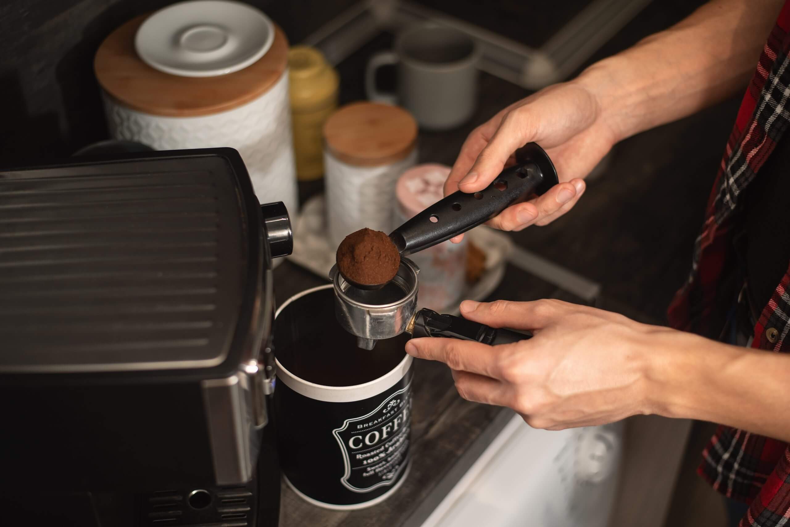 person preparing coffee