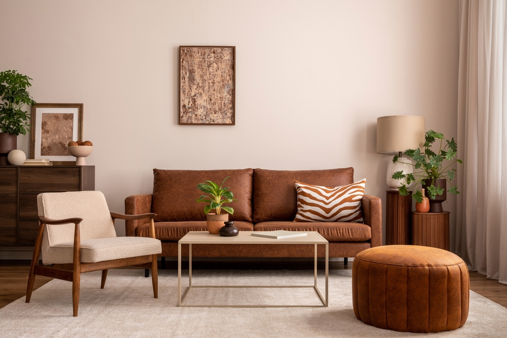 living room with burnt sienna off whites and gold