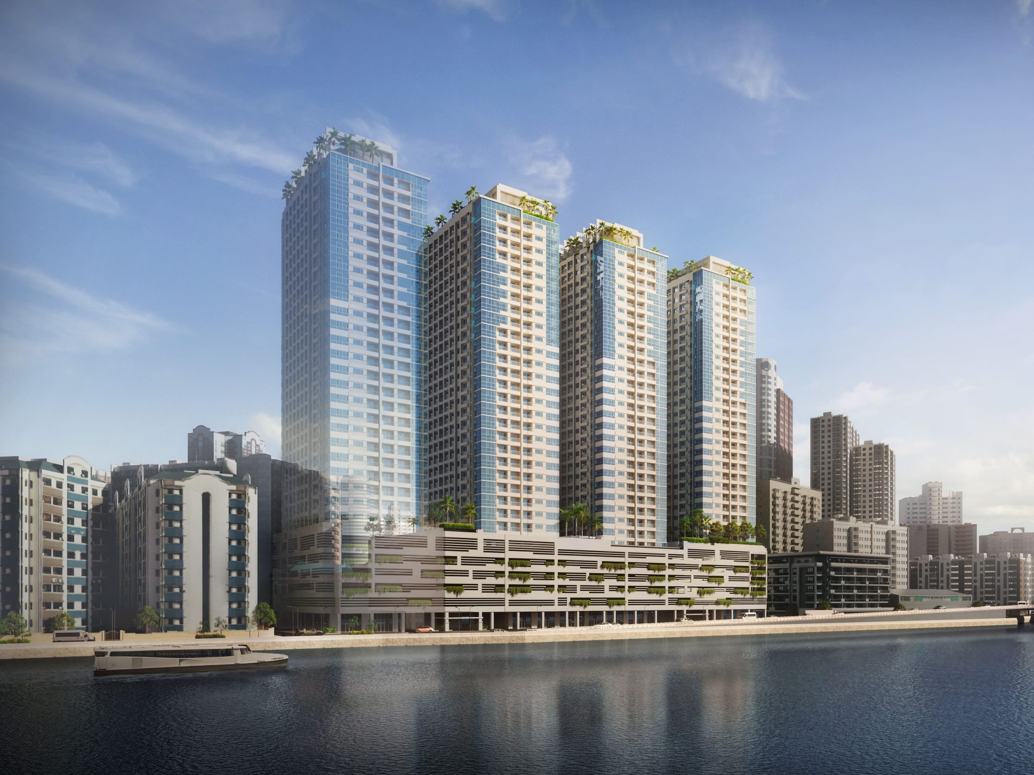 Tall residential building against a clear blue sky, with adjacent structures visible in the foreground.