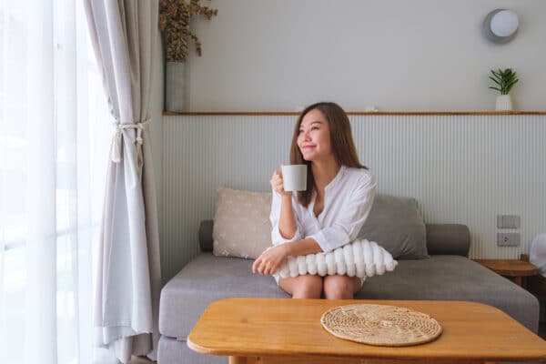 woman drinking hot coffee