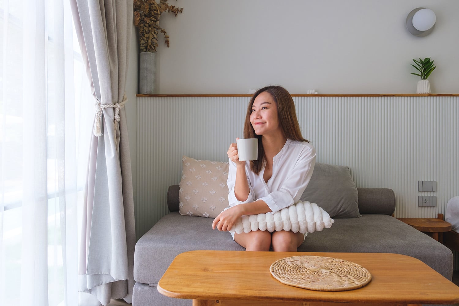 woman drinking hot coffee